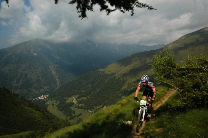 Graeme Arnott enjoys the high single track in Italy. Racers will travel a long way for good single track. Photo: Sportograf Graeme Arnott enjoys the high single track in Italy. Racers will travel a long way for good single track. Photo: Sportograf
