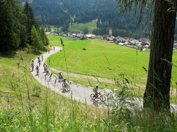 Riders looked like ants as they switch-backed up the hill.