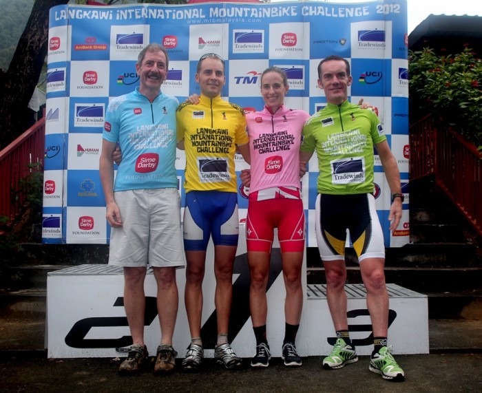 Category leaders after Stage 4 (from left) Hartmut Hofmann for Senior Men's Master (BLUE) Fabian Giger for Men's Open (YELLOW), Lea Davison for Women's Open (PINK) and Nicholas Craig for Men's Master (GREEN) (photo by MTBMalaysia.com) Category leaders after Stage 4 (from left) Hartmut Hofmann for Senior Men's Master (BLUE) Fabian Giger for Men's Open (YELLOW), Lea Davison for Women's Open (PINK) and Nicholas Craig for Men's Master (GREEN) (photo by MTBMalaysia.com)
