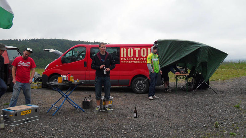 A feed zone at Trans Germany. Note the DJ set up at the back of the van.