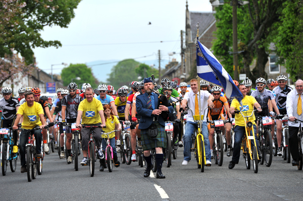 Great support from Newcastleton, with a lead out through the village. Photo: Joolz Dymond