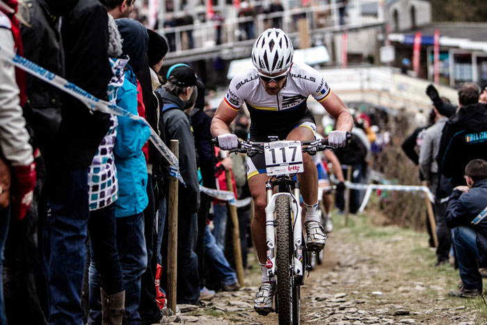 Up, up, up past Belgian fans. Photo: Sportograf