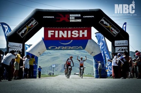 Crossing the final finish line - Cory Wallace wins the 2012 Mongolia Bike Challenge