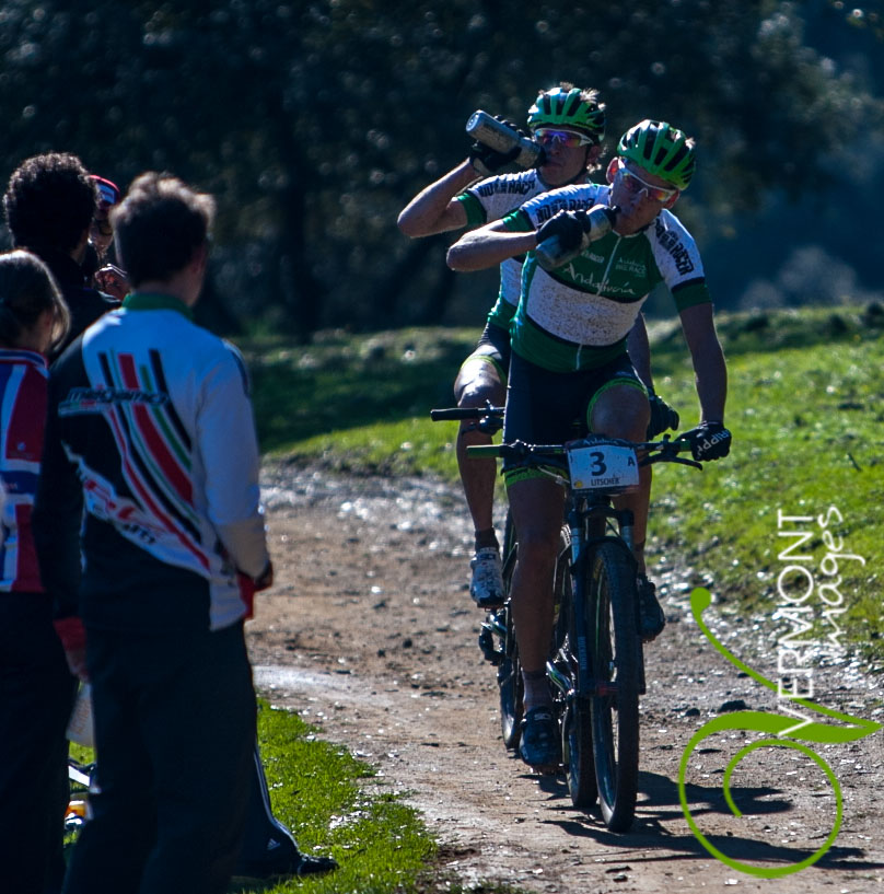 Riders take the opportunity to get fluid on board during stage 2